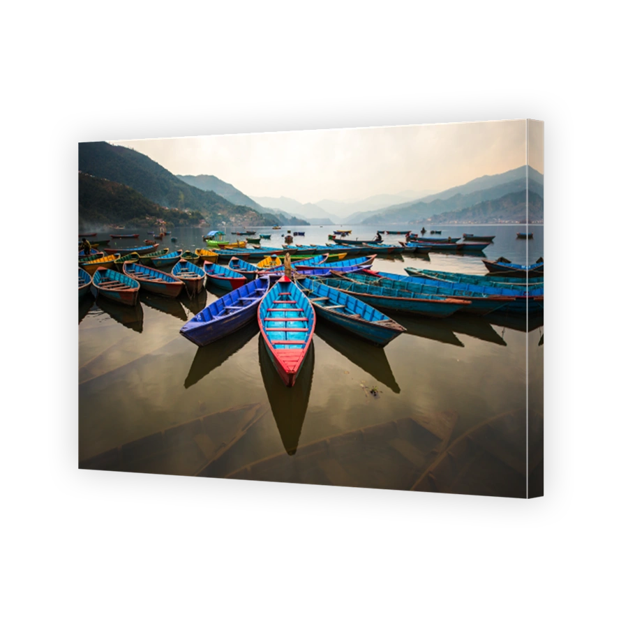twilight with boats on Phewa lake, Pokhara, Nepal