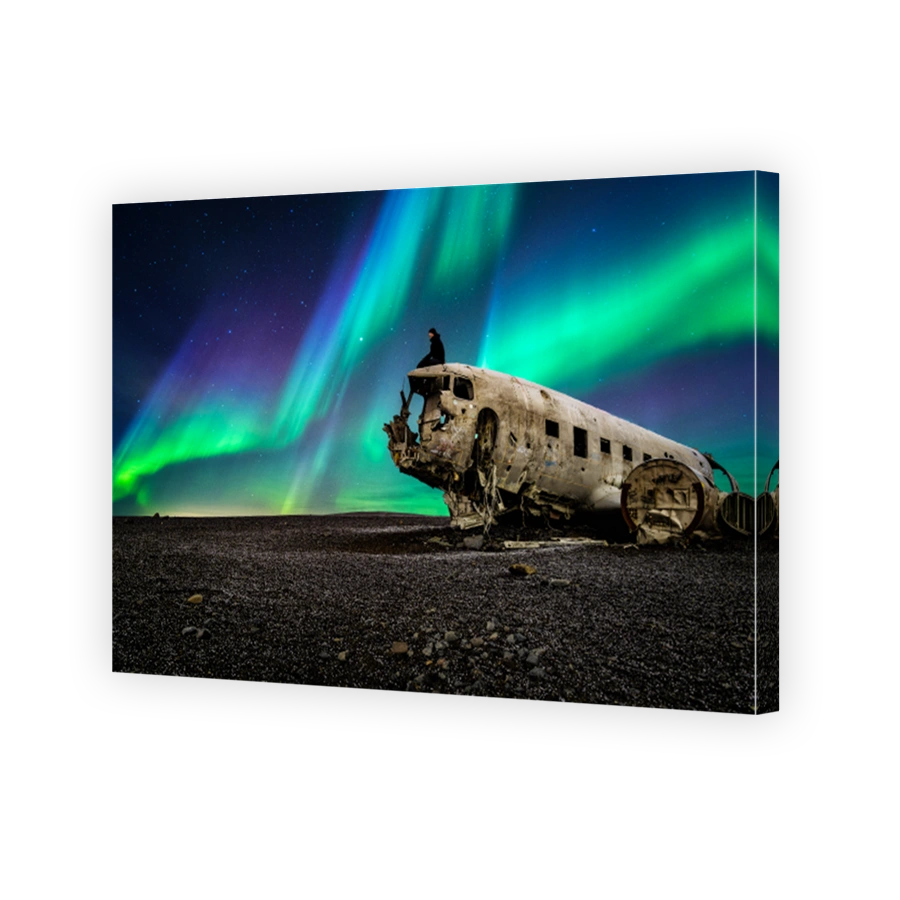 Northern lights over plane wreckage in Iceland