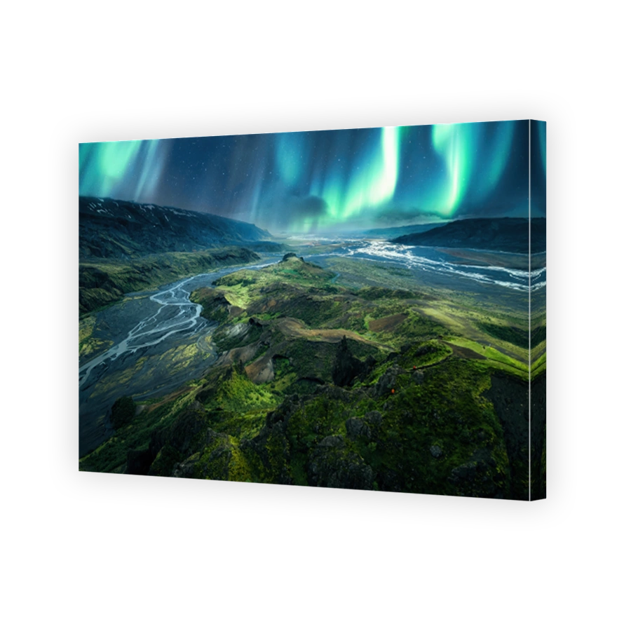 Scenery of Aurora borealis over volcanic mountain of Valahnukur trail in Icelandic highlands at Thorsmork