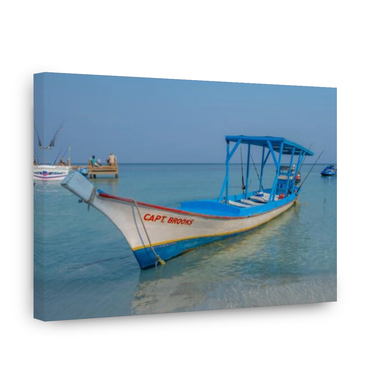 Traditional wooden boat used as a tourist fishing boat in Wesy Bay Roatan Honduras.