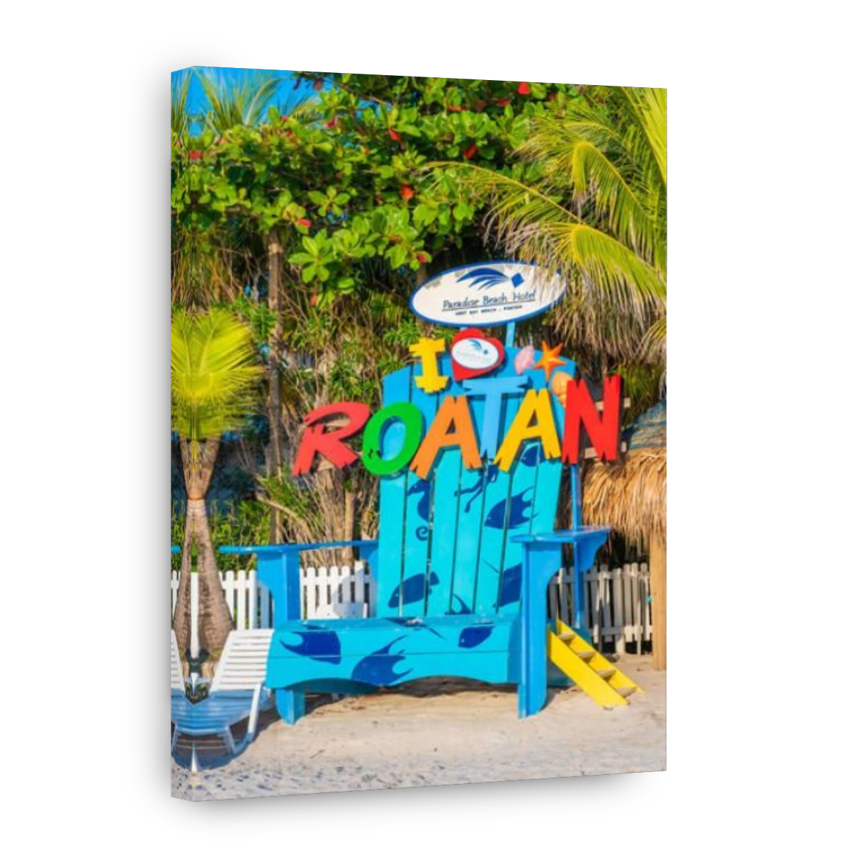 Beachside attraction an oversized beach chair on West Bay Beach Roatan Honduras.