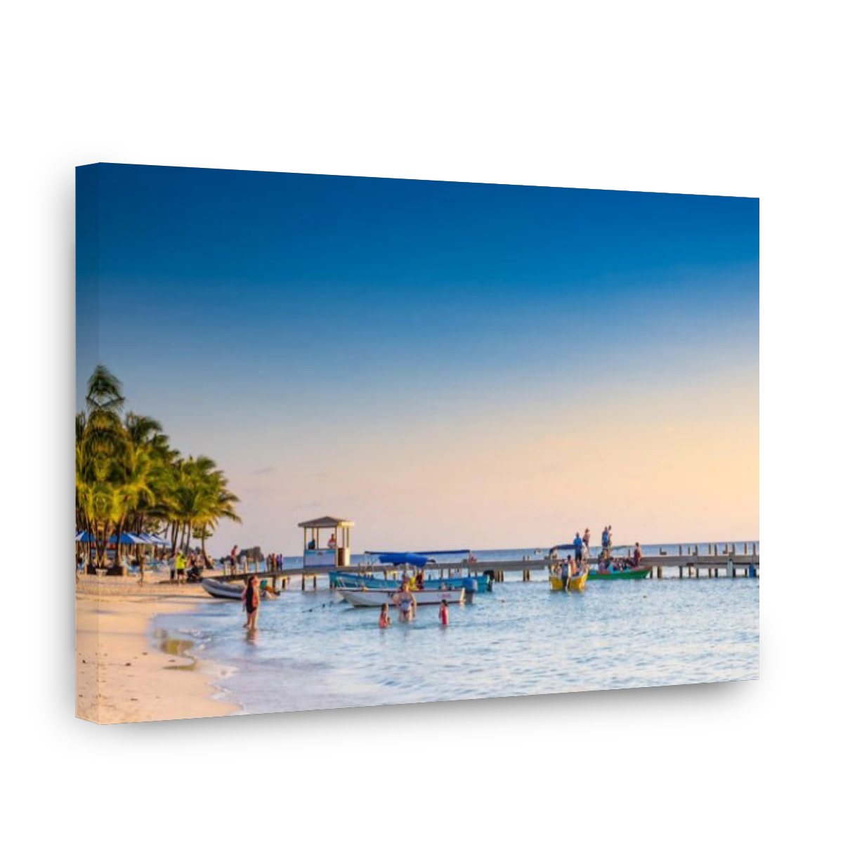 People enjoying a warm evening sunset at West Bay Roatan Honduras