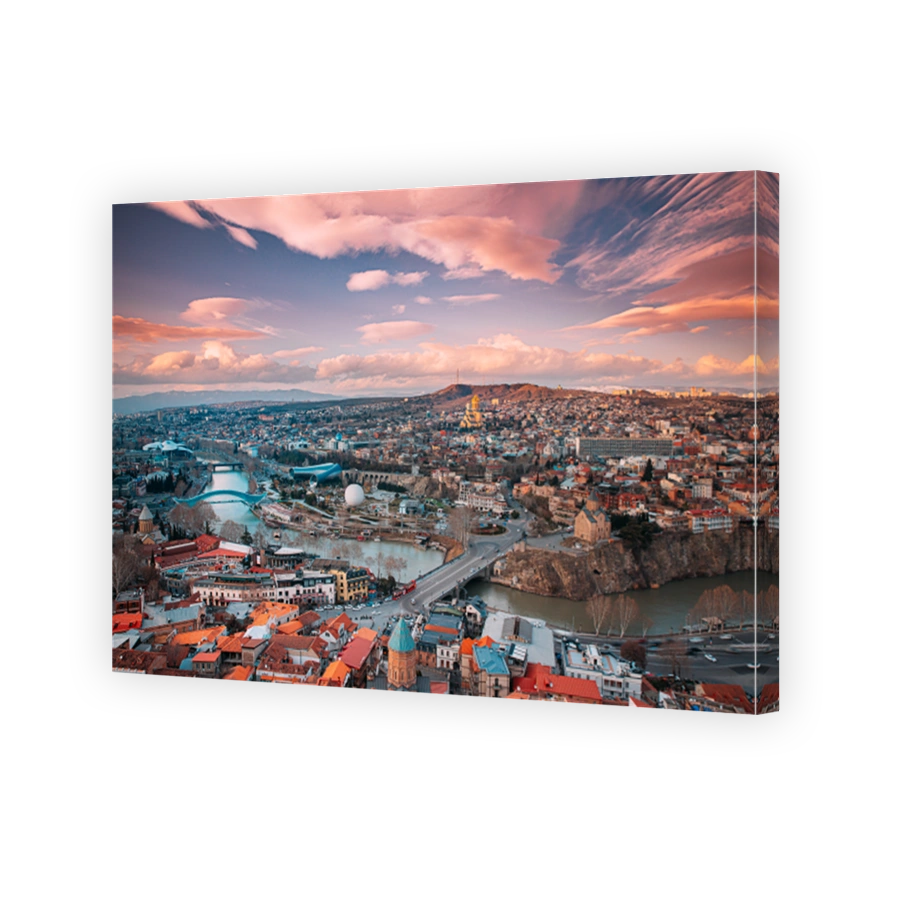 Tbilisi, Georgia. Top View Of Famous Landmarks In spring sunset Evening. Georgian Capital Skyline Cityscape