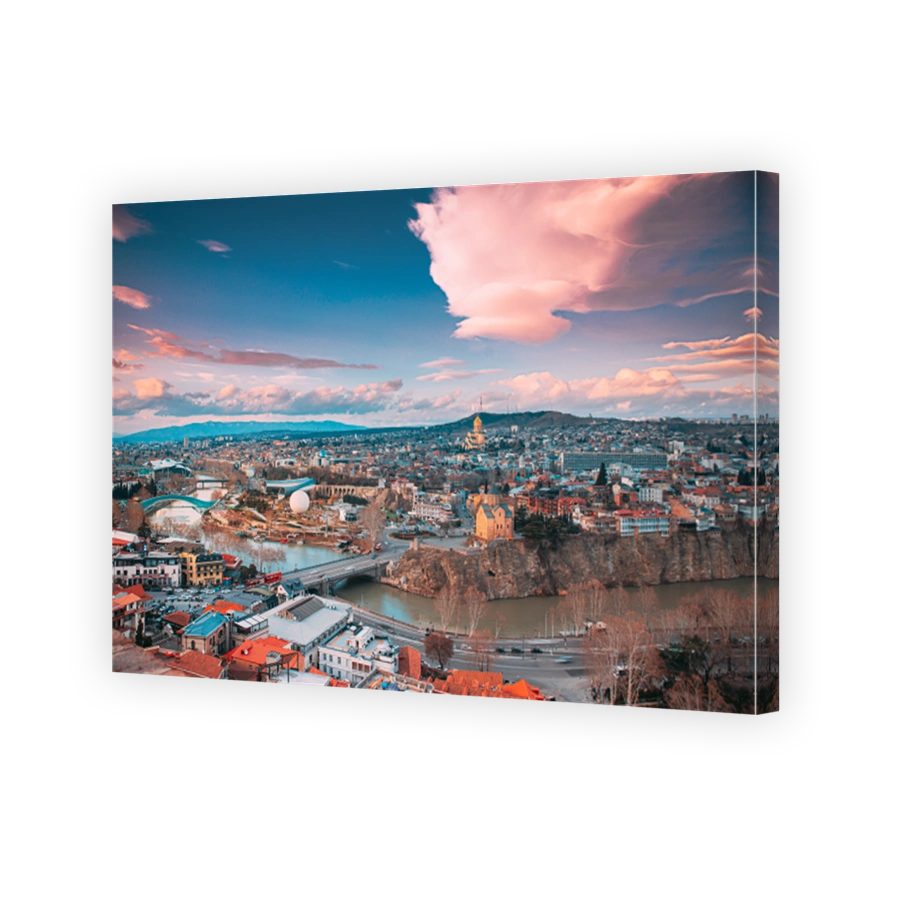 Tbilisi, Georgia. Top View Of Famous Landmarks In spring sunset Evening. Georgian Capital Skyline Cityscape.