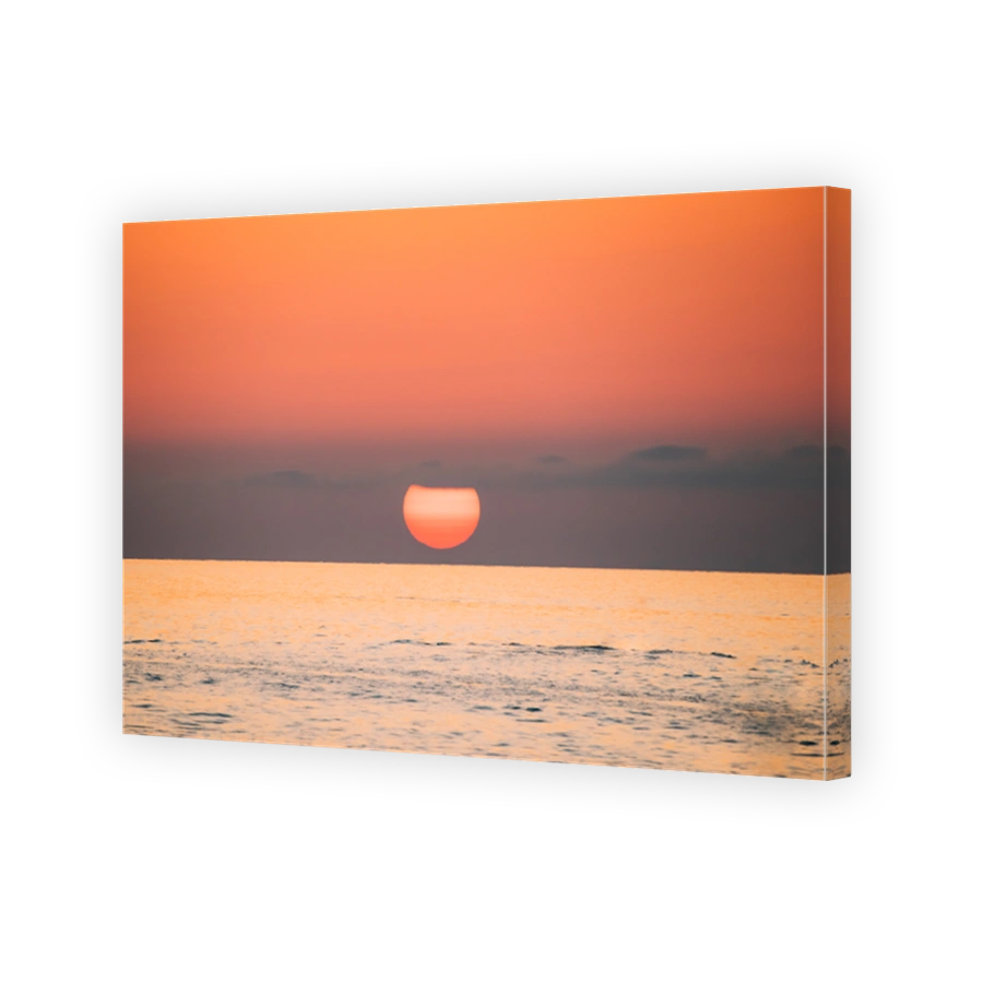 Sundown Above Sea Horizon At Sunset. Natural Sunrise Sky Warm Colors Over Ocean