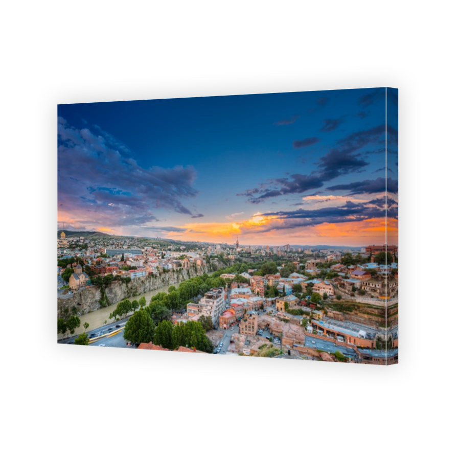 Tbilisi, Georgia. Evening Top View Of City At Colorful Sunset. Cityscape. Old Historic District Abanotubani