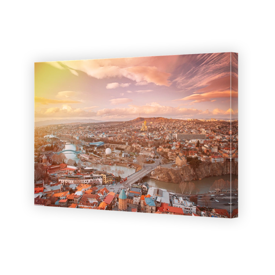 Tbilisi, Georgia. Top View Of Famous Landmarks In spring sunset Evening. Georgian Capital Skyline Cityscape. Justice House, Bridge Of Peace, Concert Hall, Rike Park And Presidential Palace, Metekhi.