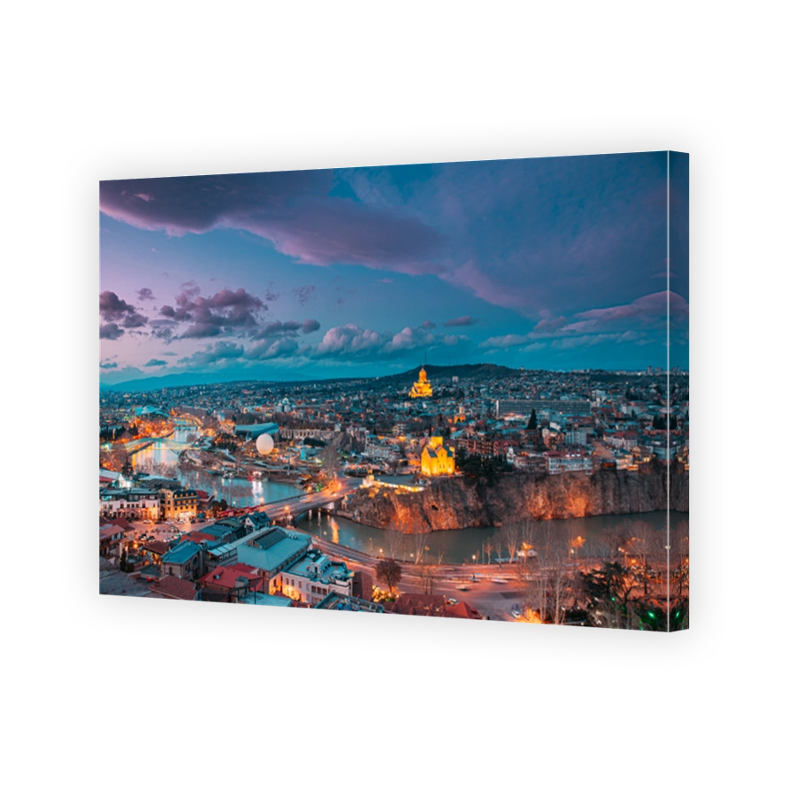 Tbilisi, Georgia. Top View Of Famous Landmarks In spring sunset Evening. Georgian Capital Skyline Cityscape. Justice House, Bridge Of Peace, Concert Hall, Rike Park And Presidential Palace, Metekhi