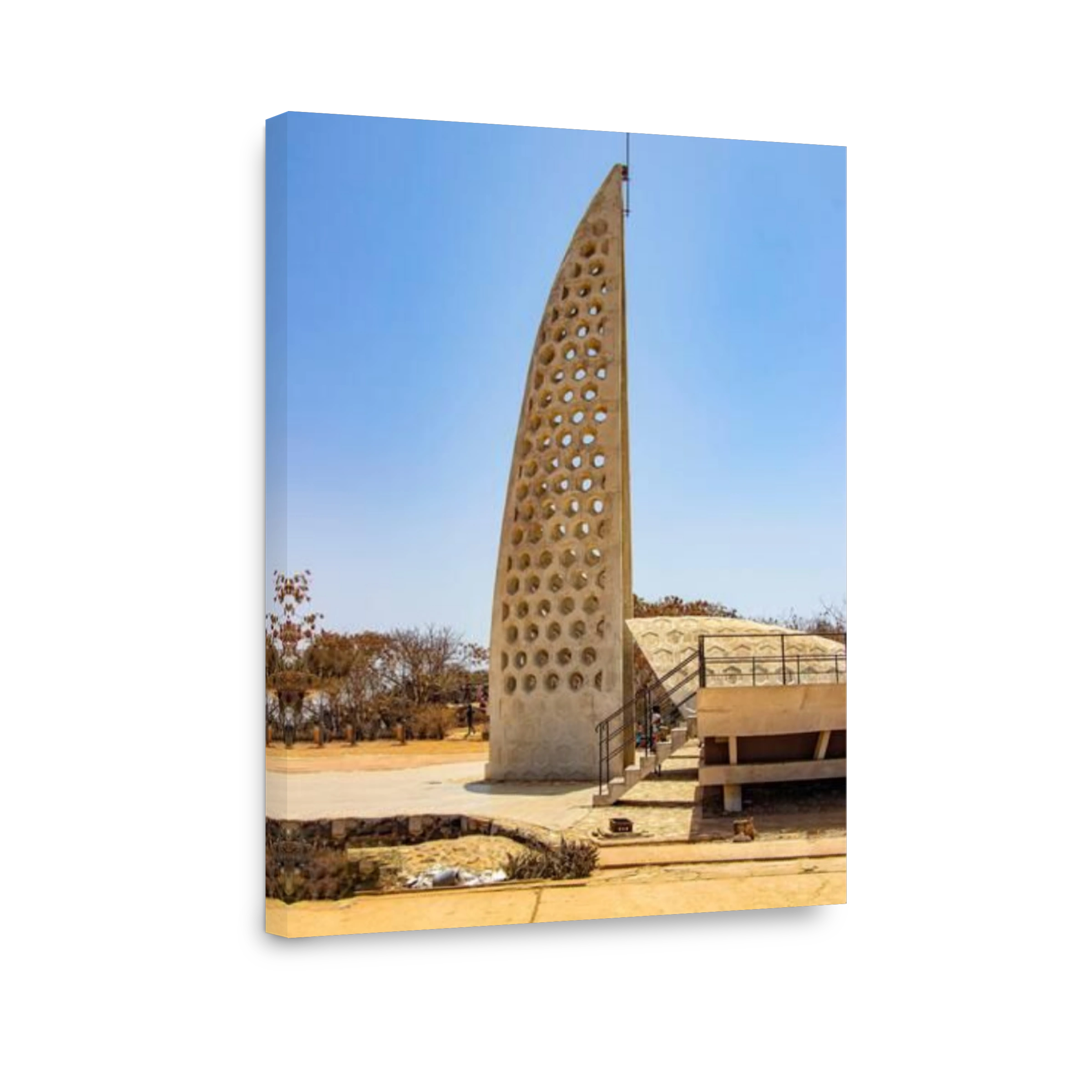 Concrete white monument on Goree island, Senegal, Africa. It stands on a hill above the city.