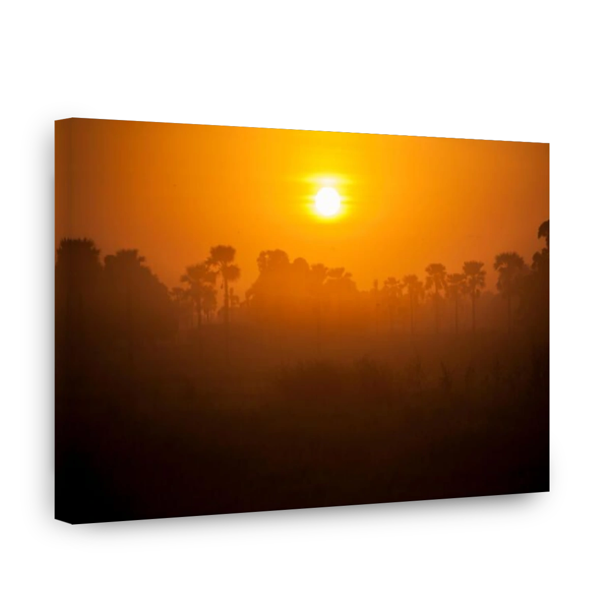 The sun sets in the village of Tengréla near Banfora, Burkina Faso.
