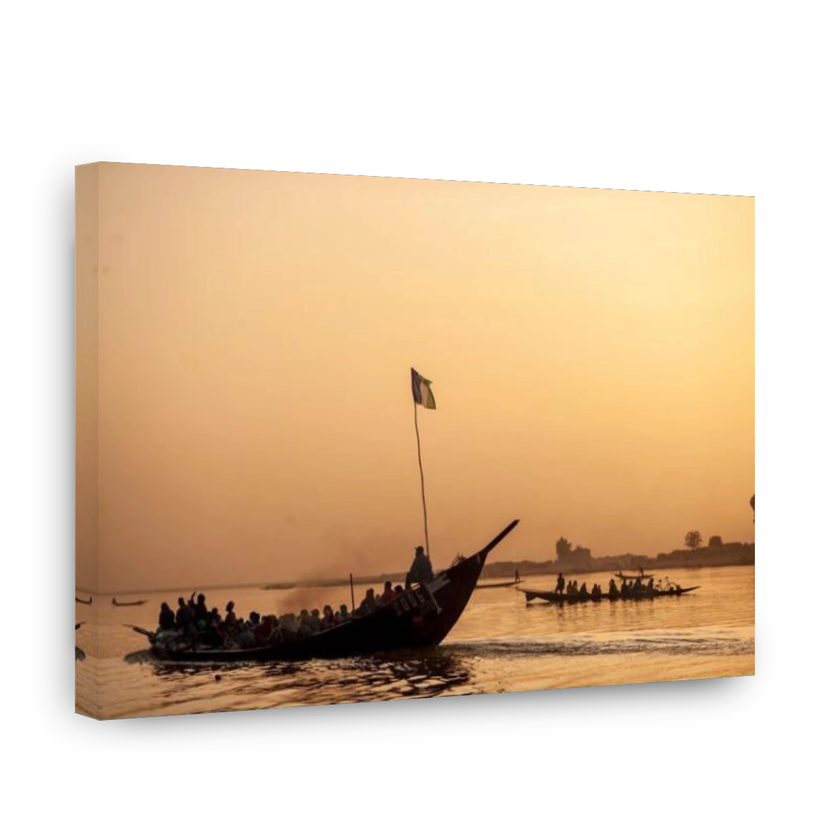 A pirogue loaded with passengers in Mopti, Mali, West Africa.