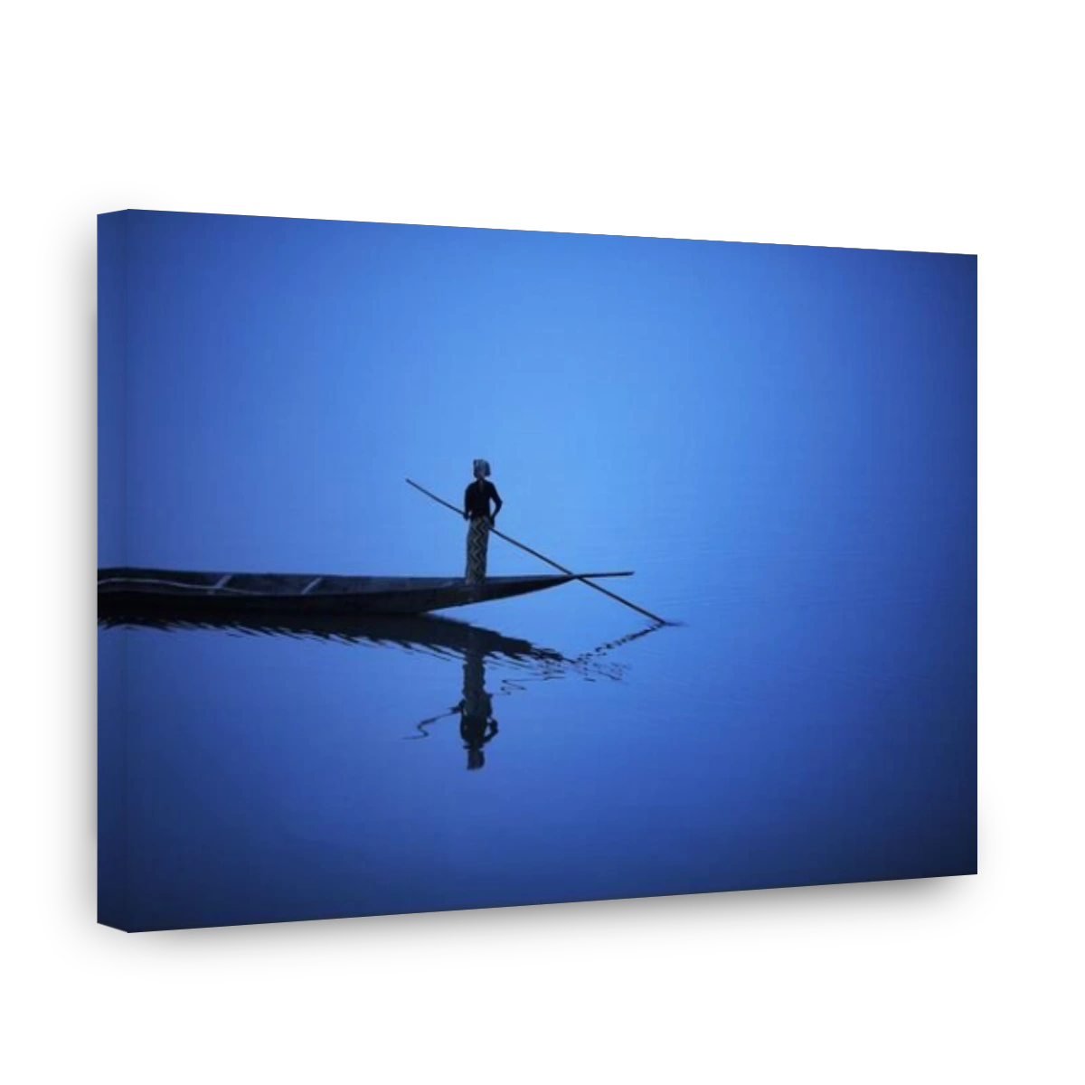 A pirogue  with one passengers in Mopti, Mali, West Africa.