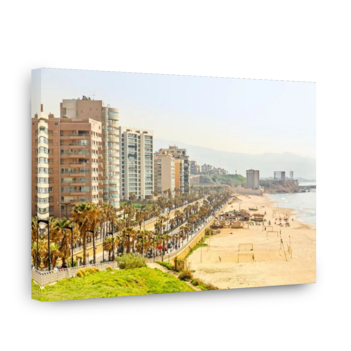 Seaside promenade with modern building, road, sandy beach and sea, Beirut, Lebanon