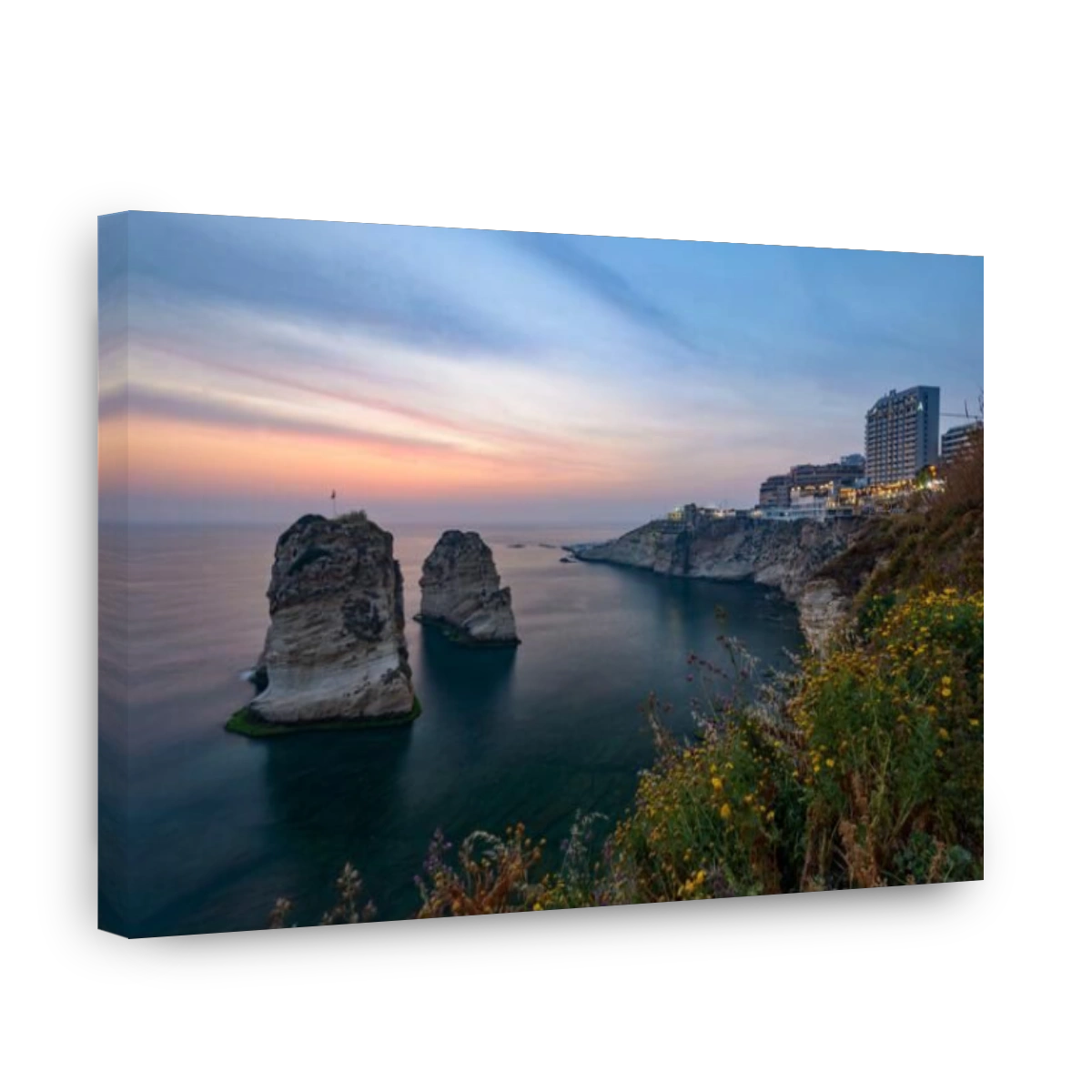 LEBANON, BEIRUT, RAS BEIRUT, PIGEON ROCK (RAOUCHE) AT DUSK