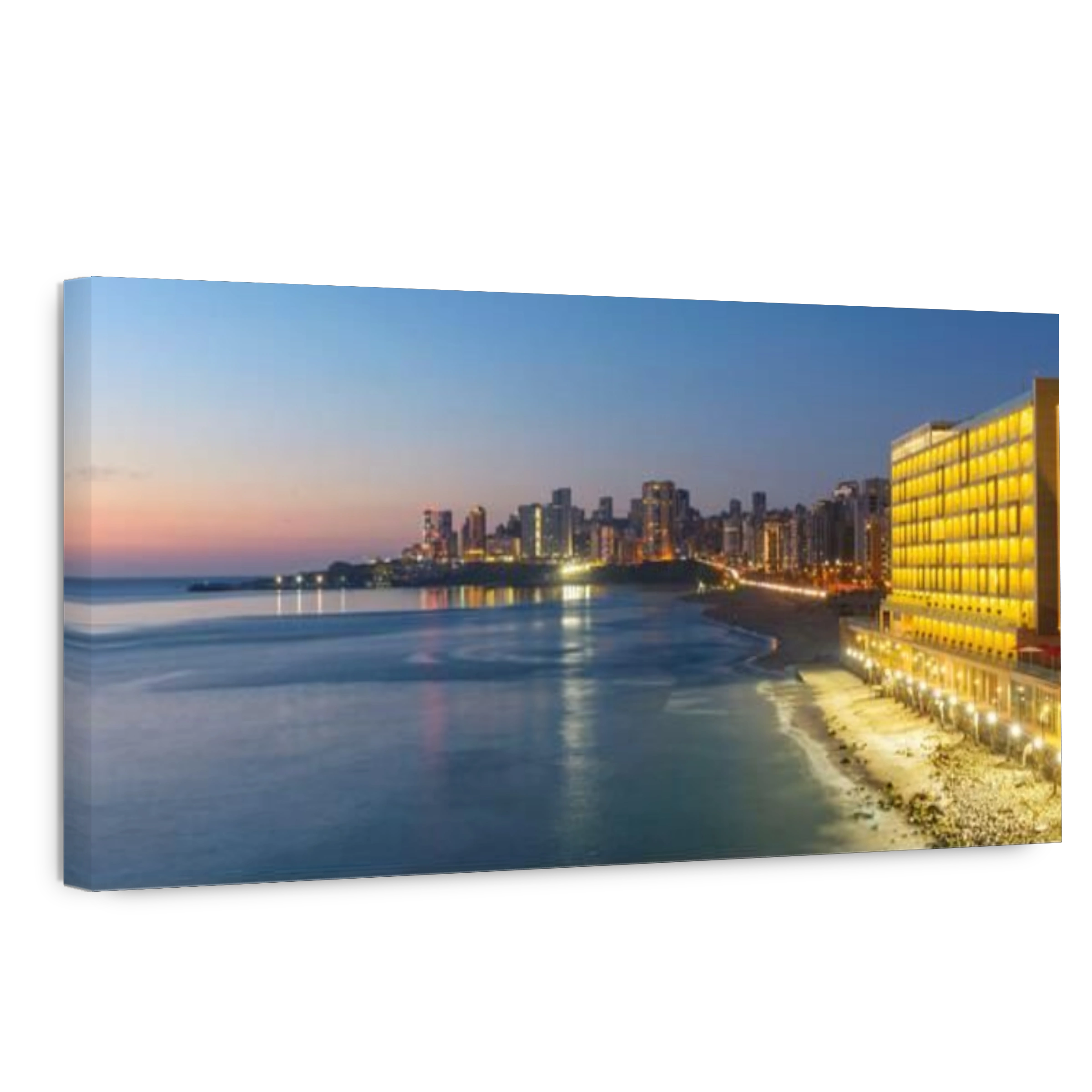 LEBANON, BEIRUT, MOUSSAITBEH, RAMLEH AL BAYDA BEACH (BEIRUT PUBLIC BEACH) AND LANCASTER EDEN BAY HOTEL AT DUSK