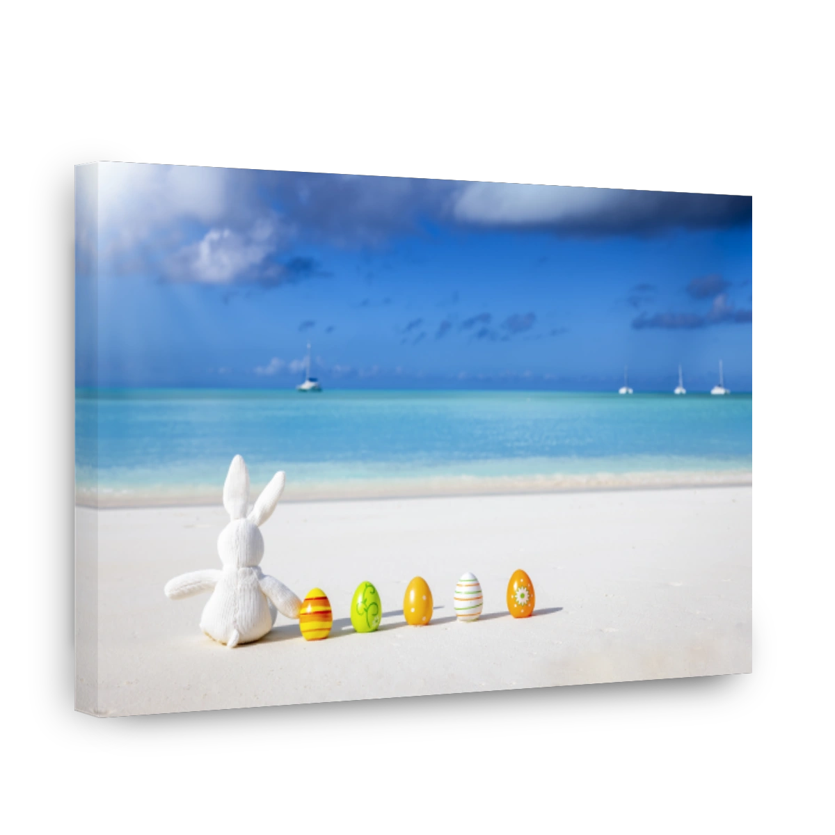 A bunny and colorful eggs sitting on a tropical paradise beach