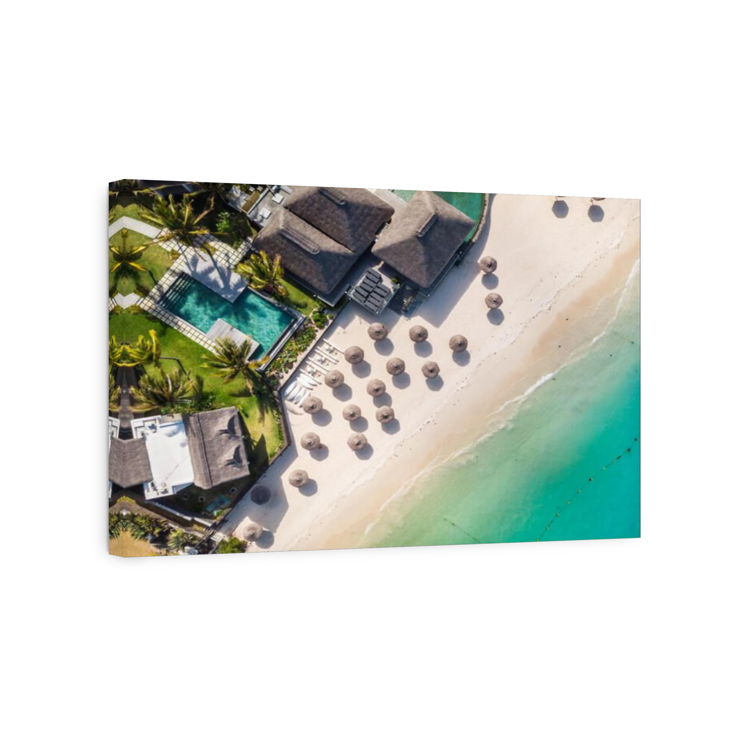 Aerial view of amazing tropical white sandy beach with palm leaves umbrellas and turquoise sea, Mauritius.