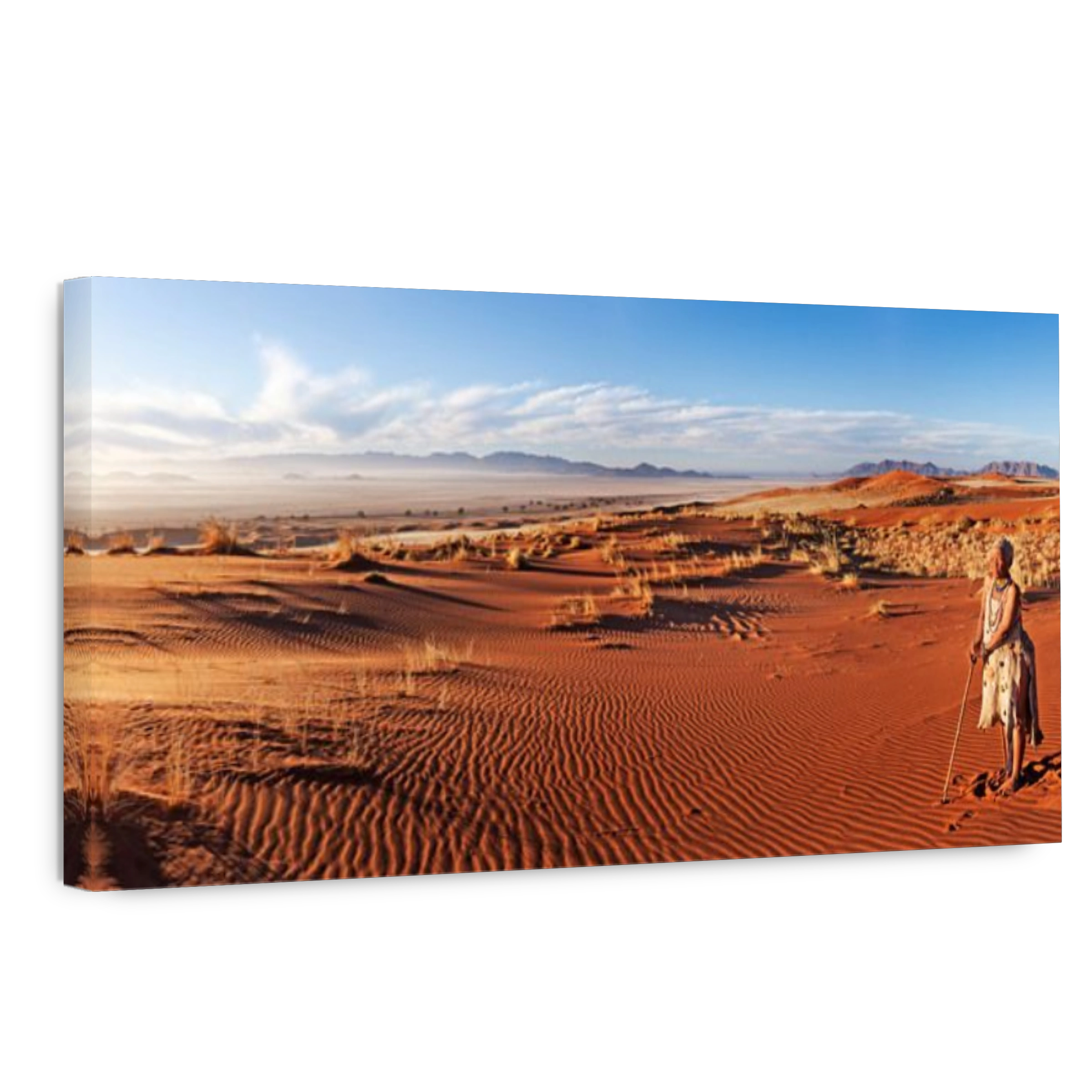 Elderly Bushman / San woman standing in desert