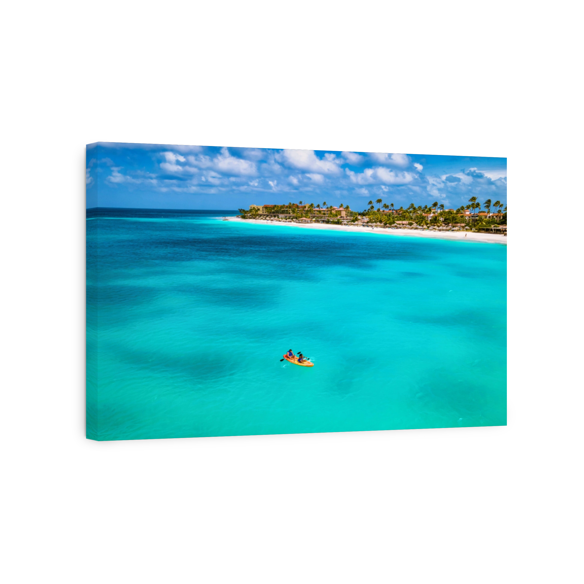 Couple enjoys kayaking adventure in the vibrant waters of Aruba Caribbean sea