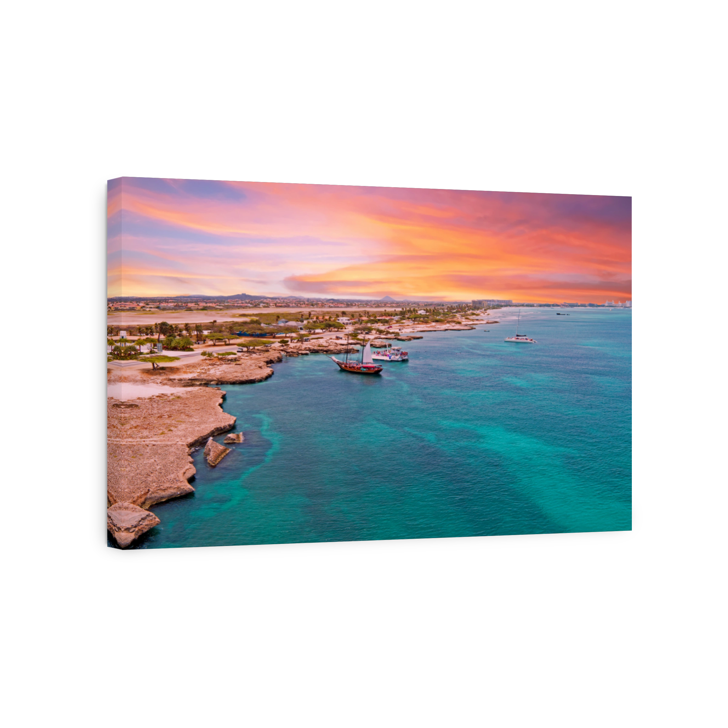Aerial from Aruba island with Palm Beach in the Caribbean Sea at sunset