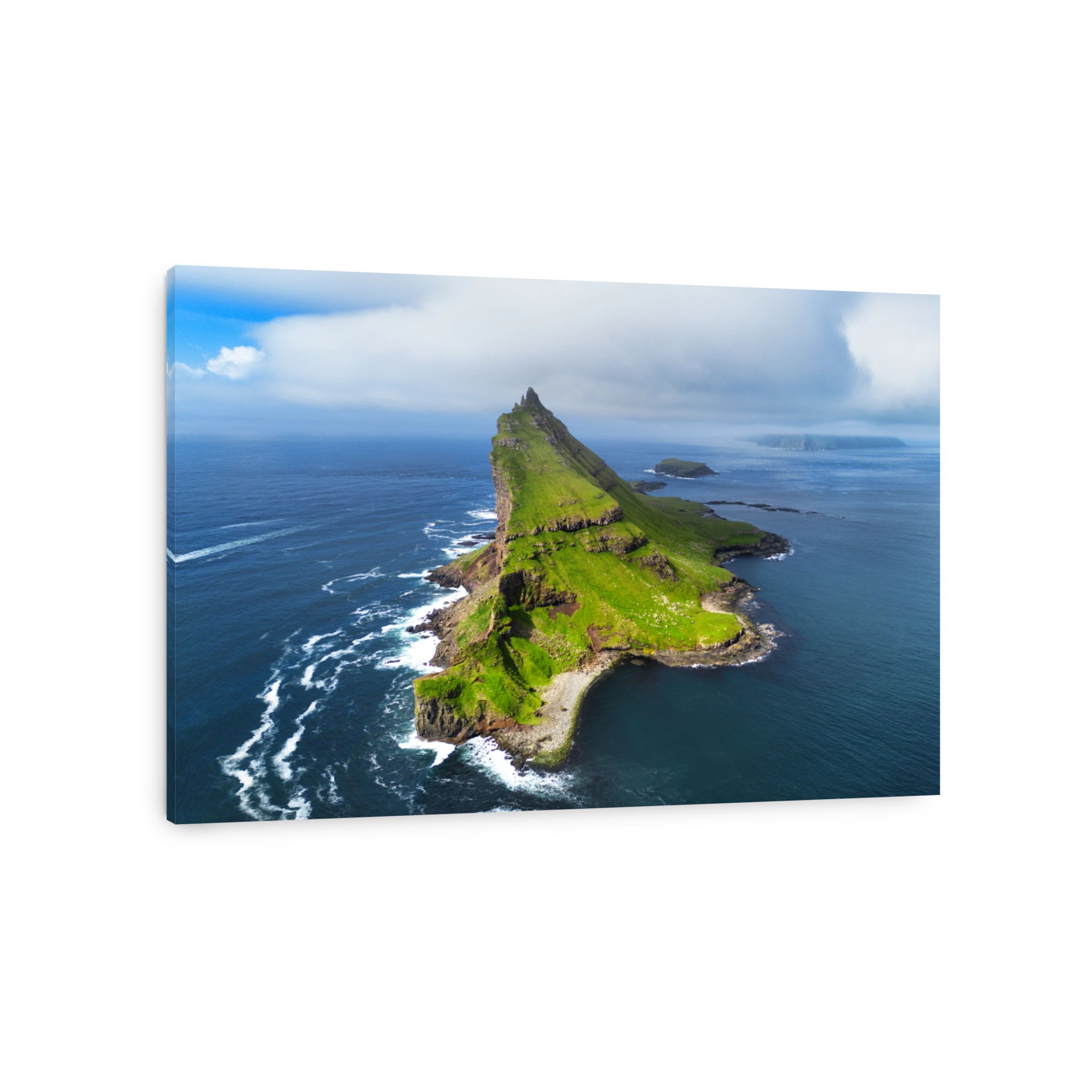 Tindholmur on Faroe Islands Vagar, aerial drone view during day in North Atlantic Ocean. Faroe Islands, Denmark, Europe.