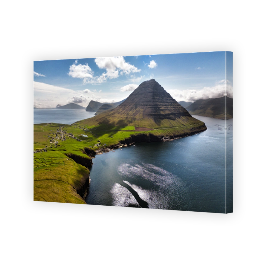 Aerial landscape photography. Amazing summer view from flying drone of Vidareidi village. Beautiful summer scenery. Sunny outdoor scene of Vidoy island, Faroe Islands, Denmark, Europe.