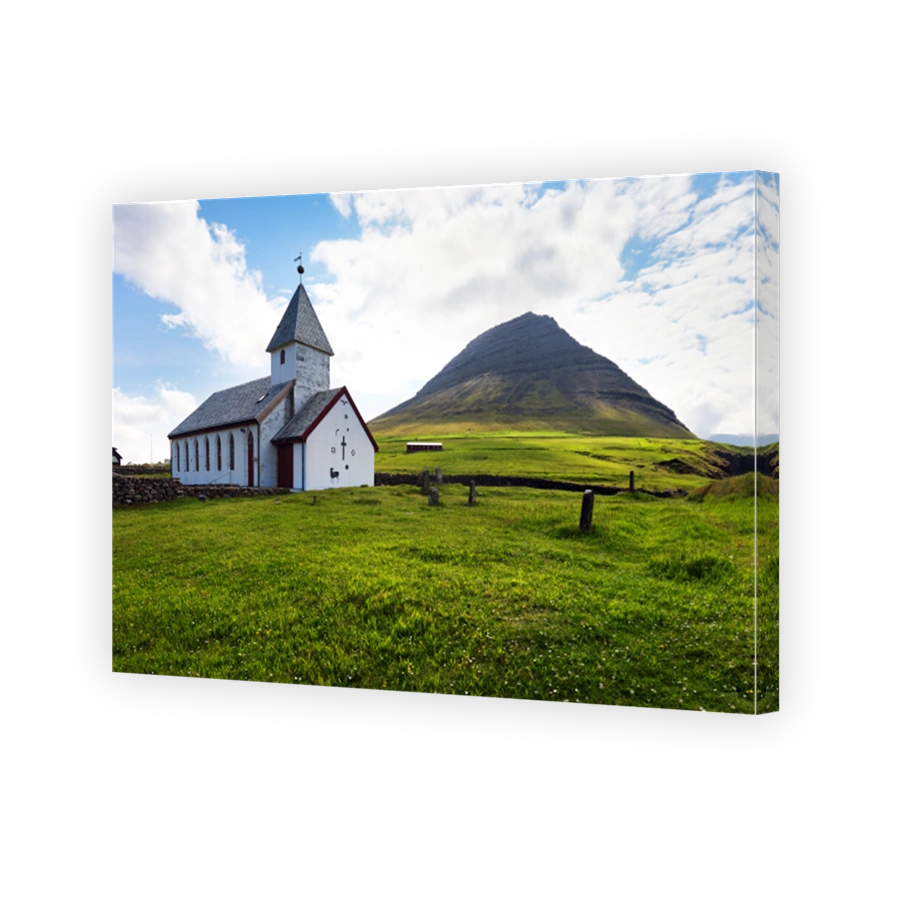 Faroe Islands - Church by the sea with ocean and mountain panorama, Vidareidi, , Denmark, Northern Europe