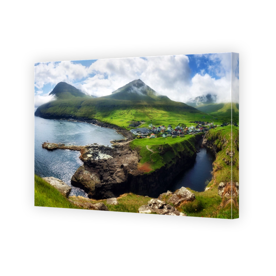 Faroe islands - Village of Gjogv on cliffs washed by the ocean, Eysturoy - Denmark, Europe
