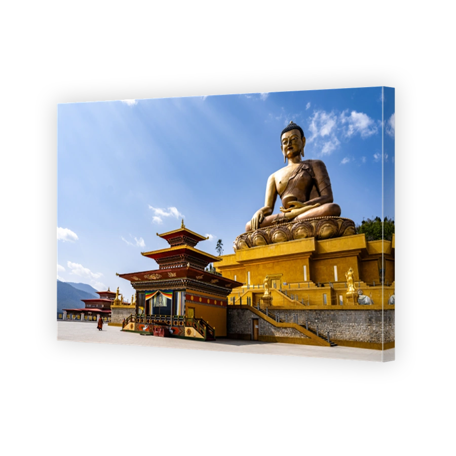 Majestic Buddha Dordenma Statue against the background of a blue sky. Bhutan