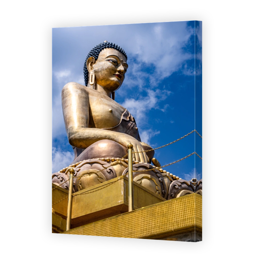 Majestic Buddha Dordenma Statue against the background of a blue sky. Bhutan