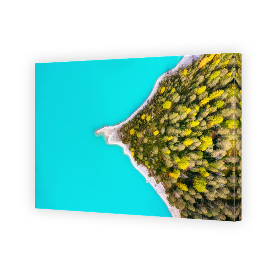 Natural landscape from air. Aerial view on the lake and forest at the autumn time. Forest and lake. Lai da Ova Spin, Zernez, Grisons, Switzerland.