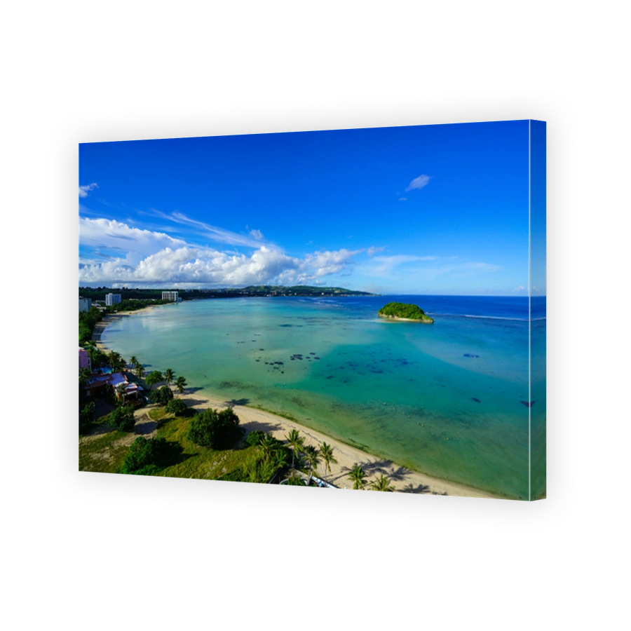 Scenic View Of Sea Against Blue Sky