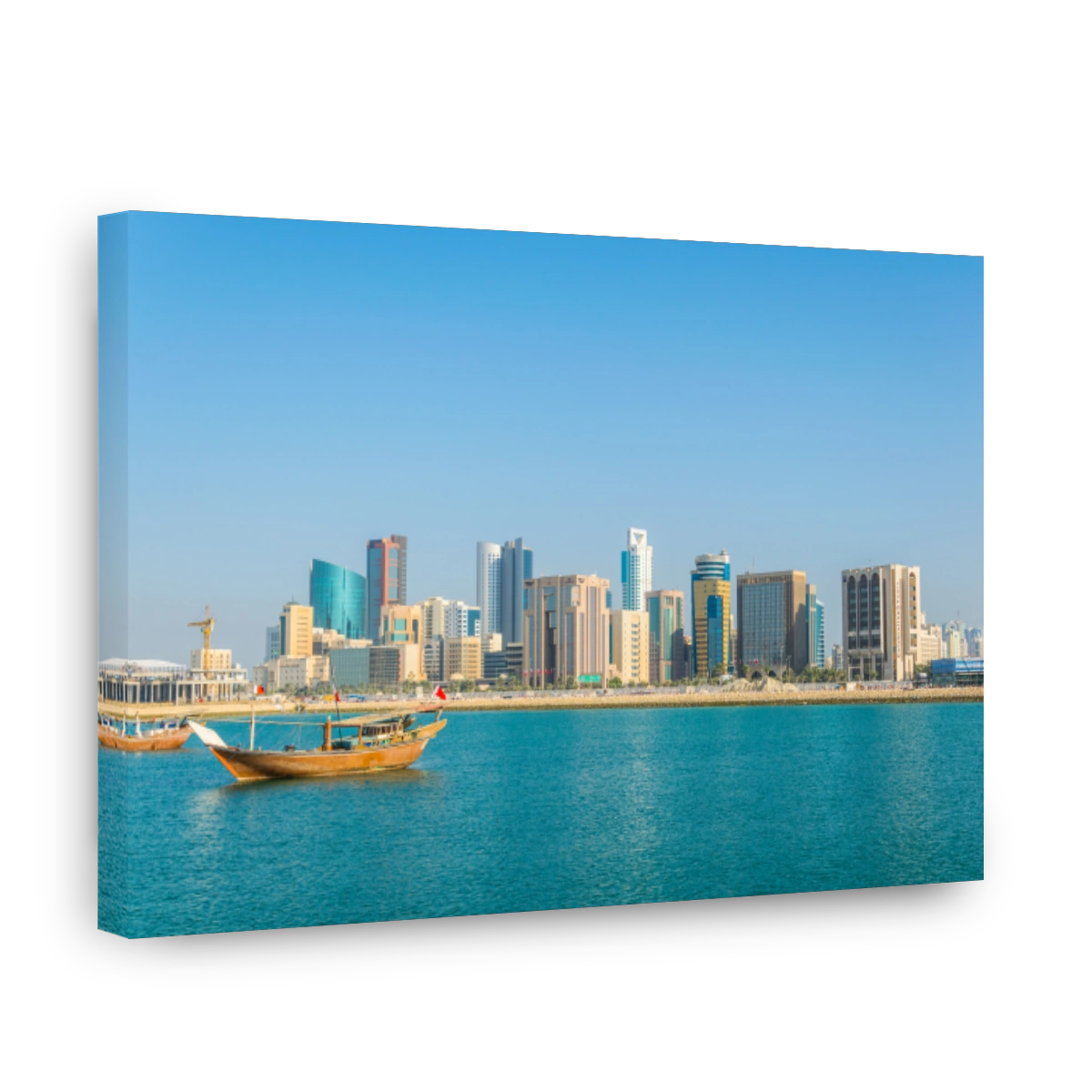 Skyline of Manama with a dhow boat, Bahrain.