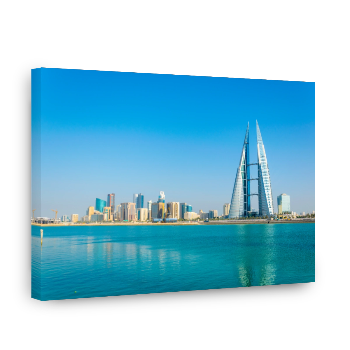 Skyline of Manama dominated by the World trade Center building during night, Bahrain.