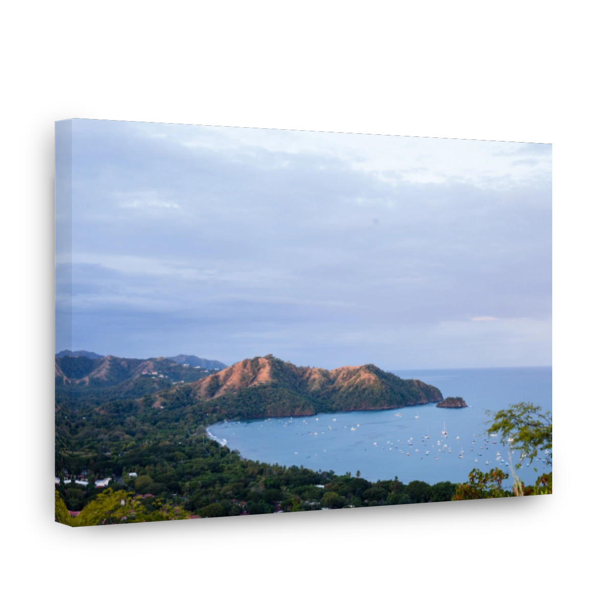 Scenic View Of Sea And Mountains Against Sky