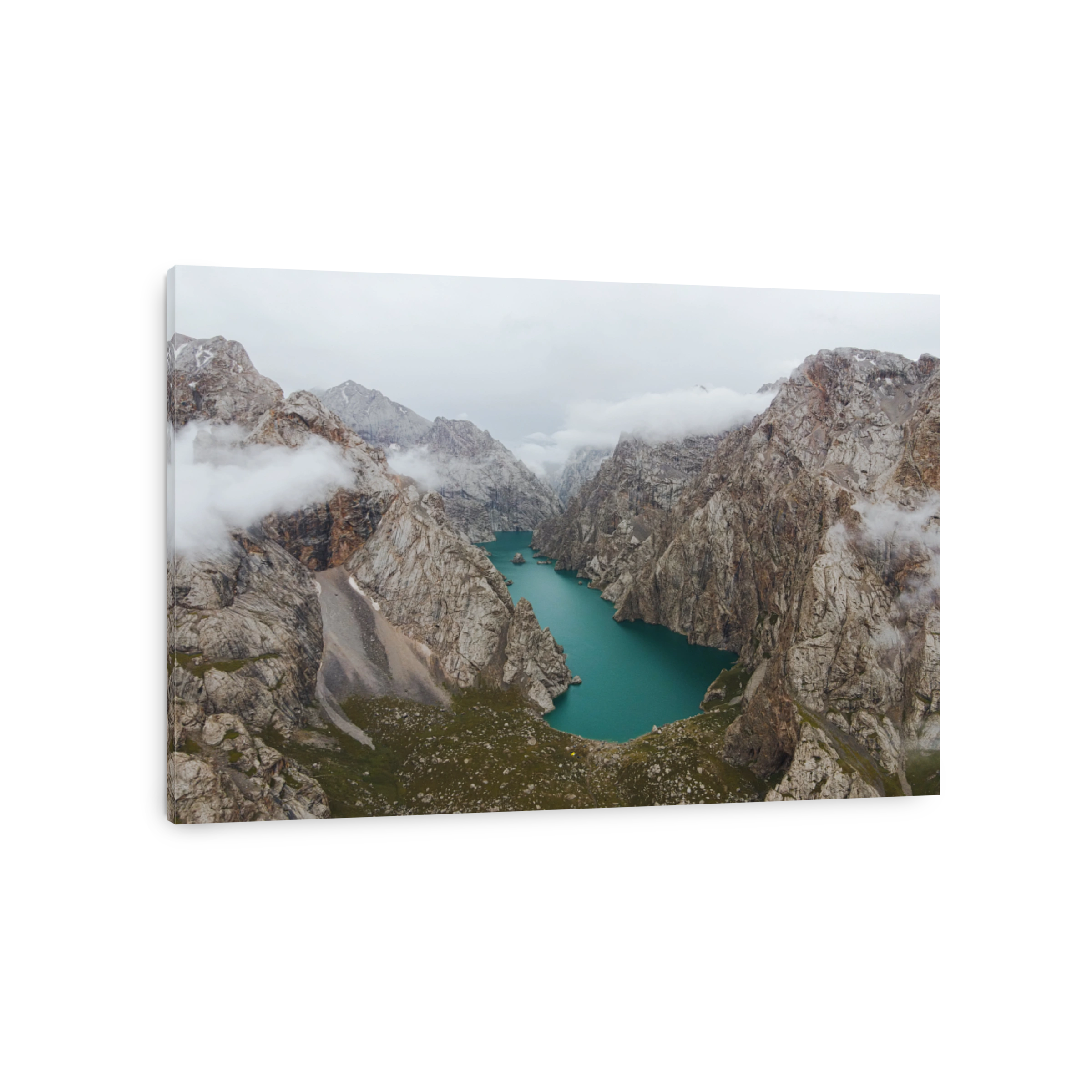 Moody aerial view of Kel-Suu lake on a cloudy day