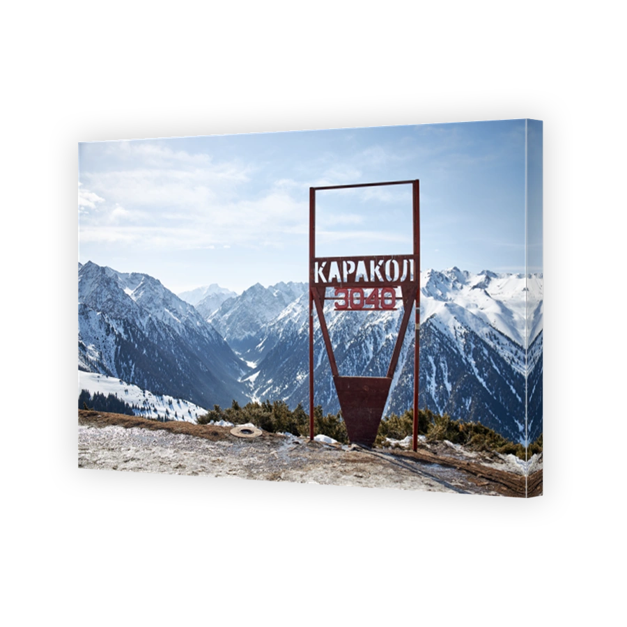 Karakol ski resort. Sign on top of the mountain height 3040 meters above sea level. Winter mountains Kyrgyzstan