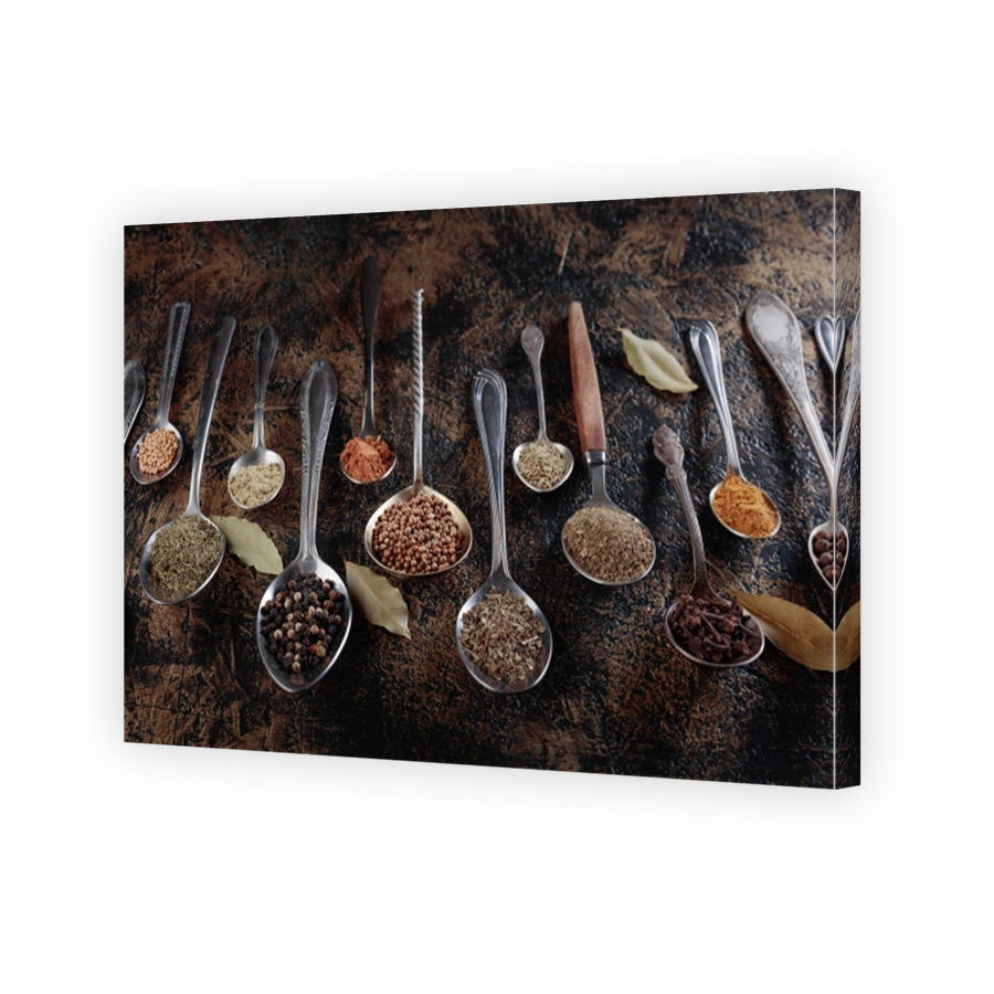 Assortment of spices in vintage spoons
