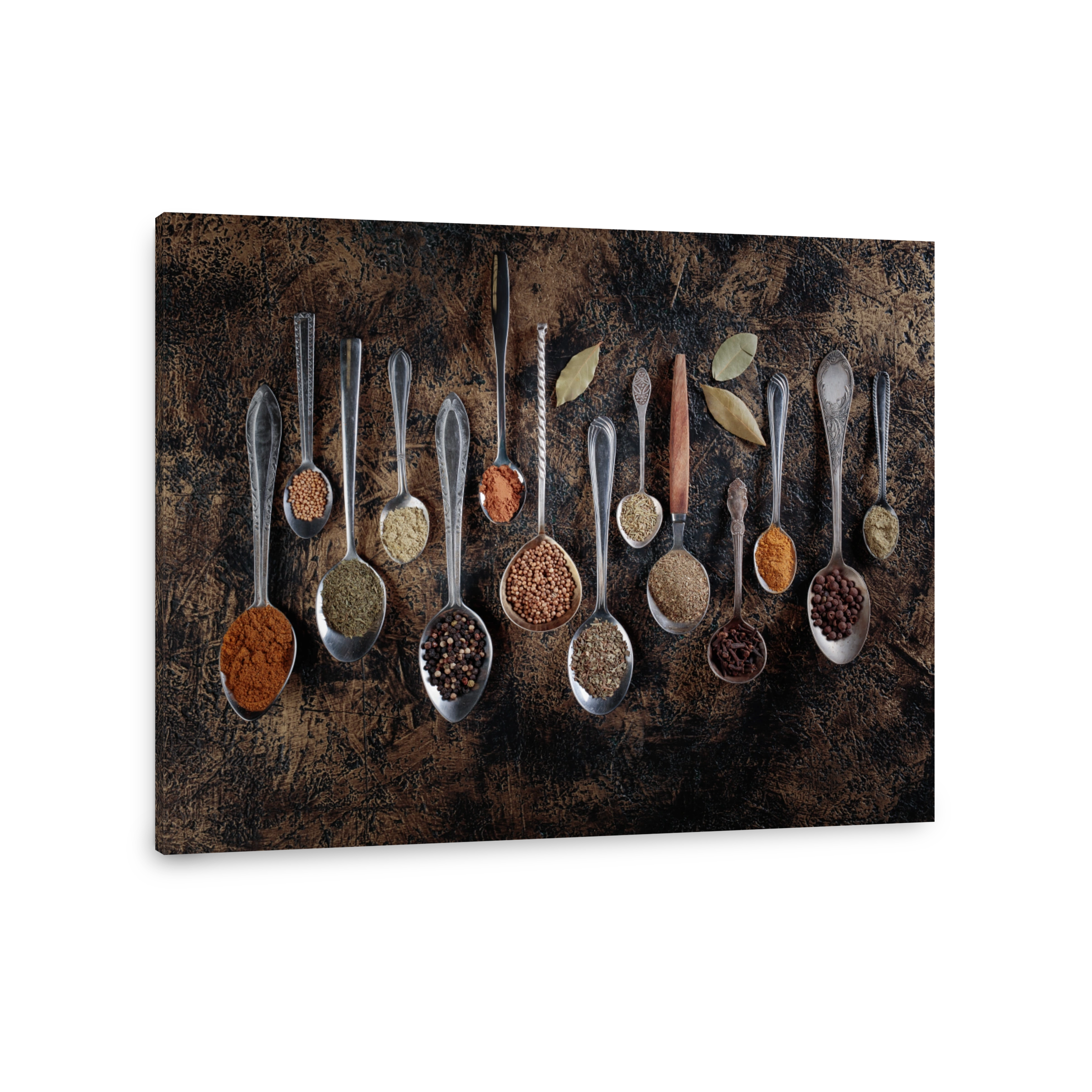 Assorted Spices in Vintage Spoons on Rustic Background