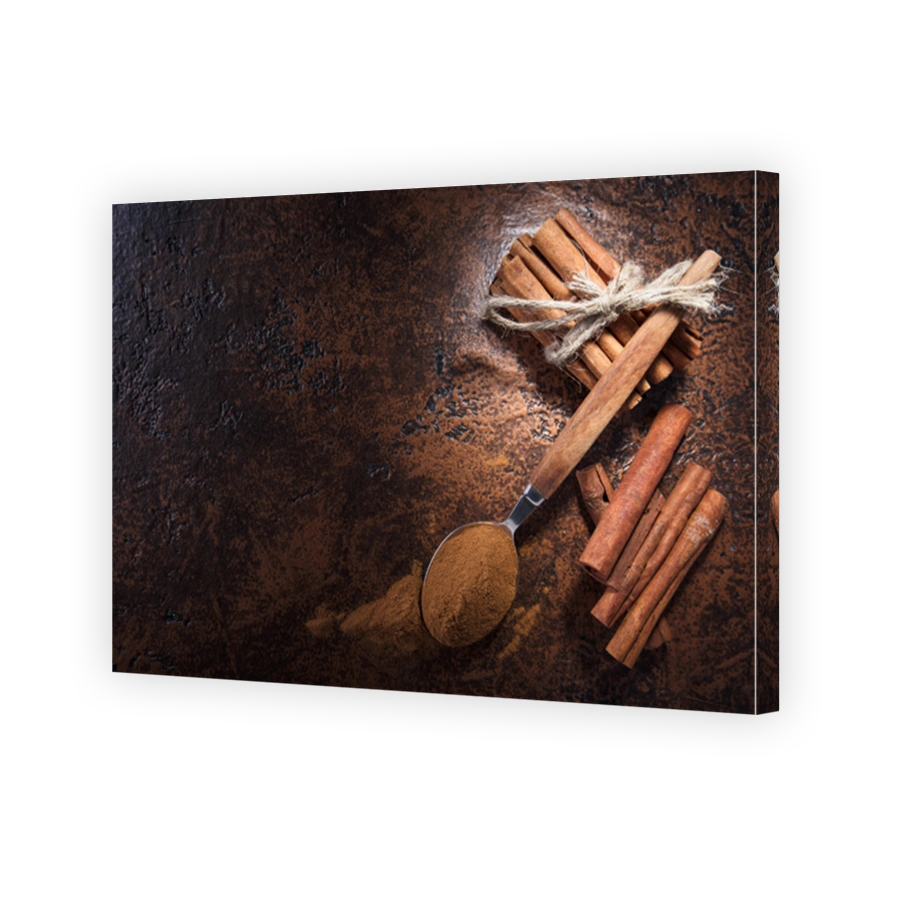 Cinnamon Sticks and Powder on Copper Surface