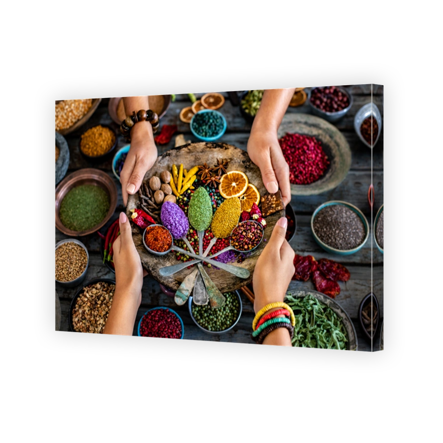 Various spices and dried fruits on the table.