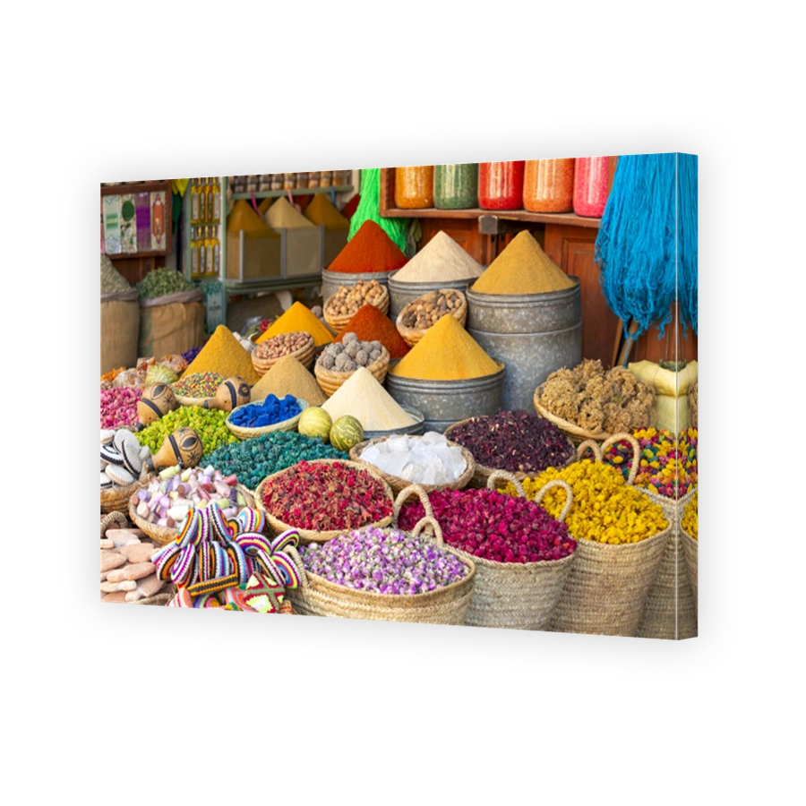 Colorful spices and dyes found at souk market in Marrakesh, Morocco.
