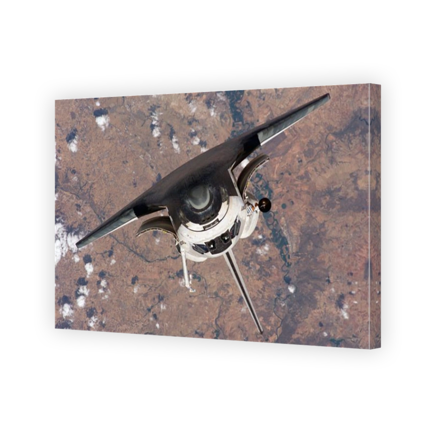Space Shuttle Discovery approaching the ISS. Optimised and enhanced version of an original NASA image. Credit NASA.