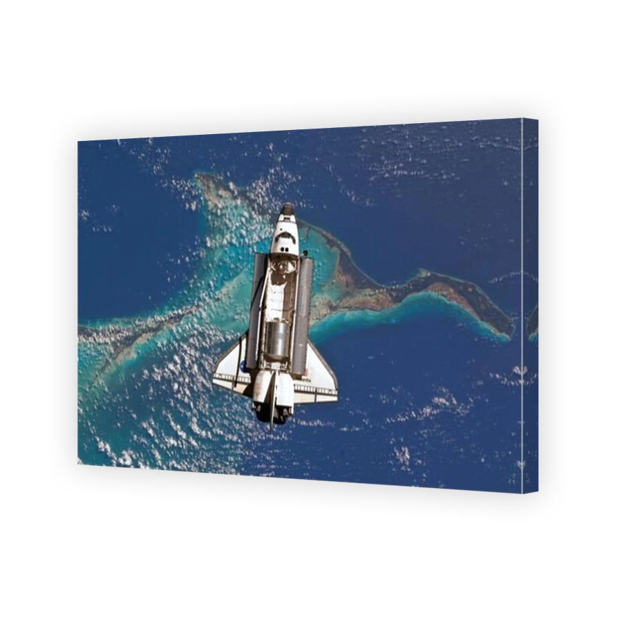 Space shuttle Atlantis is photographed from the International Space Station as it flies over the Bahamas. STS-135 launched on July 8, 2011. It was the final launch of the Space Shuttle Program. An optimised NASA image. Credit: NASA