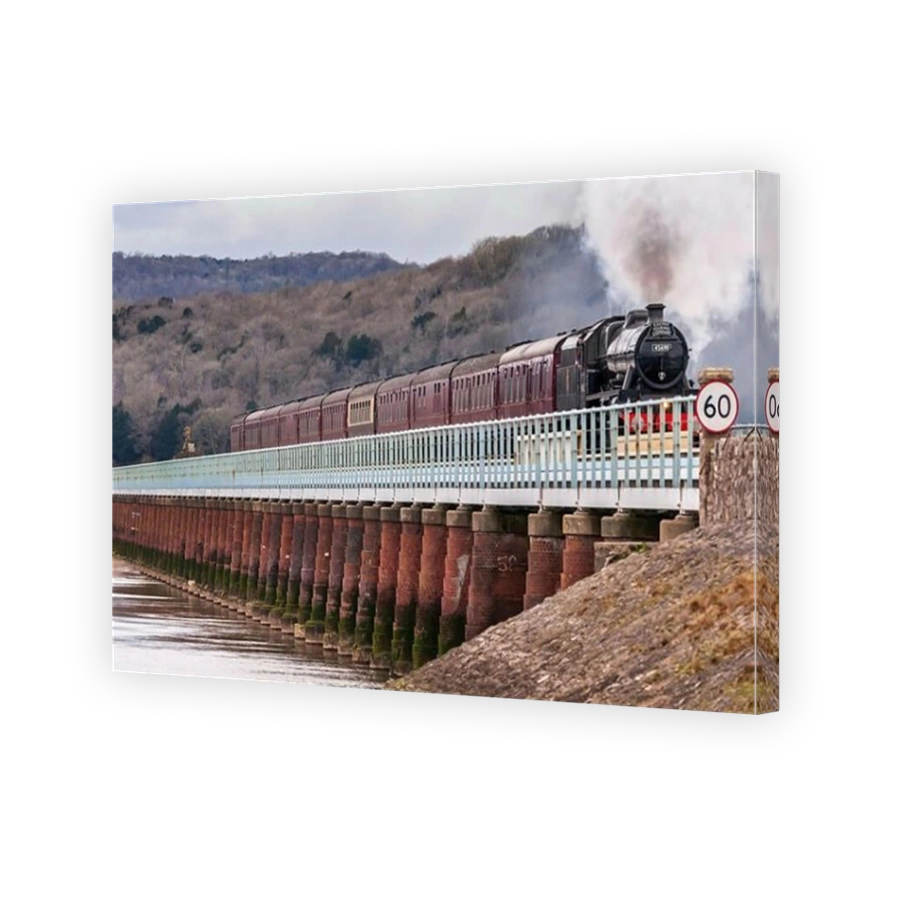 Restored steam engine Leander crossing the Arnside viaduct over the river Kent with the Cumbrian Coast Express.