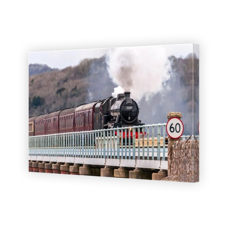 Restored steam engine Leander crossing the Arnside viaduct over the river Kent with the Cumbrian Coast Express.