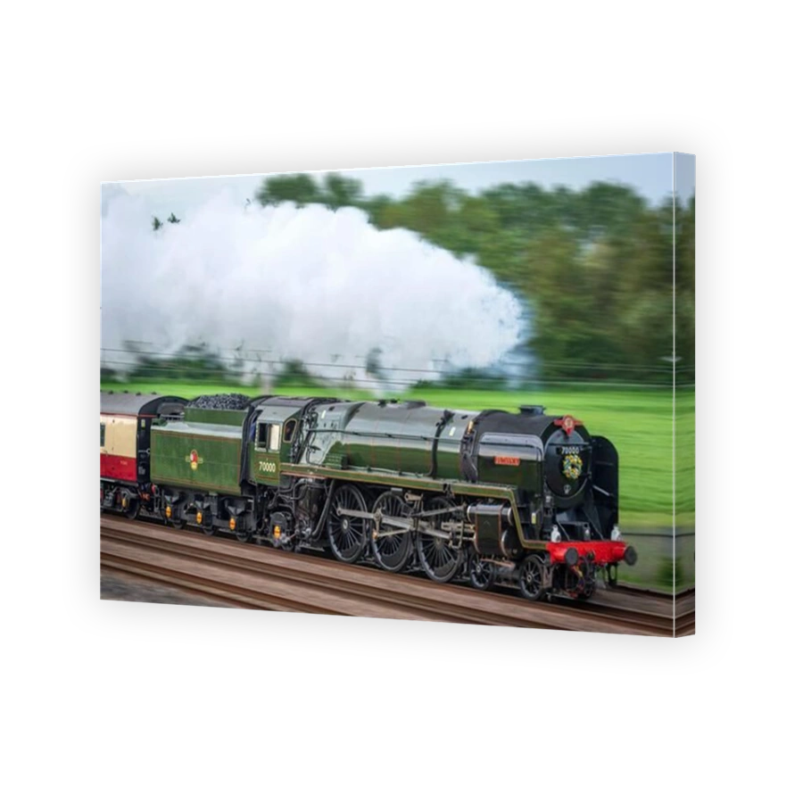 Steam loco Britannia at Winwick. Britannia was built at Crewe, completed on 2 January 1951. She was the first British Railways standard locomotive to