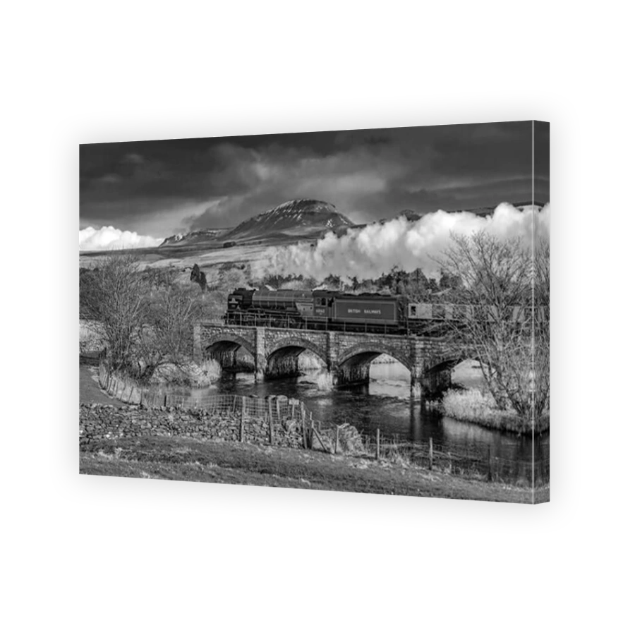 Helwith Bridge. North Yorkshire. The Peppercorn steam engine Tornado. Some airbrushing on this image. Picture by Andrew Davidson.