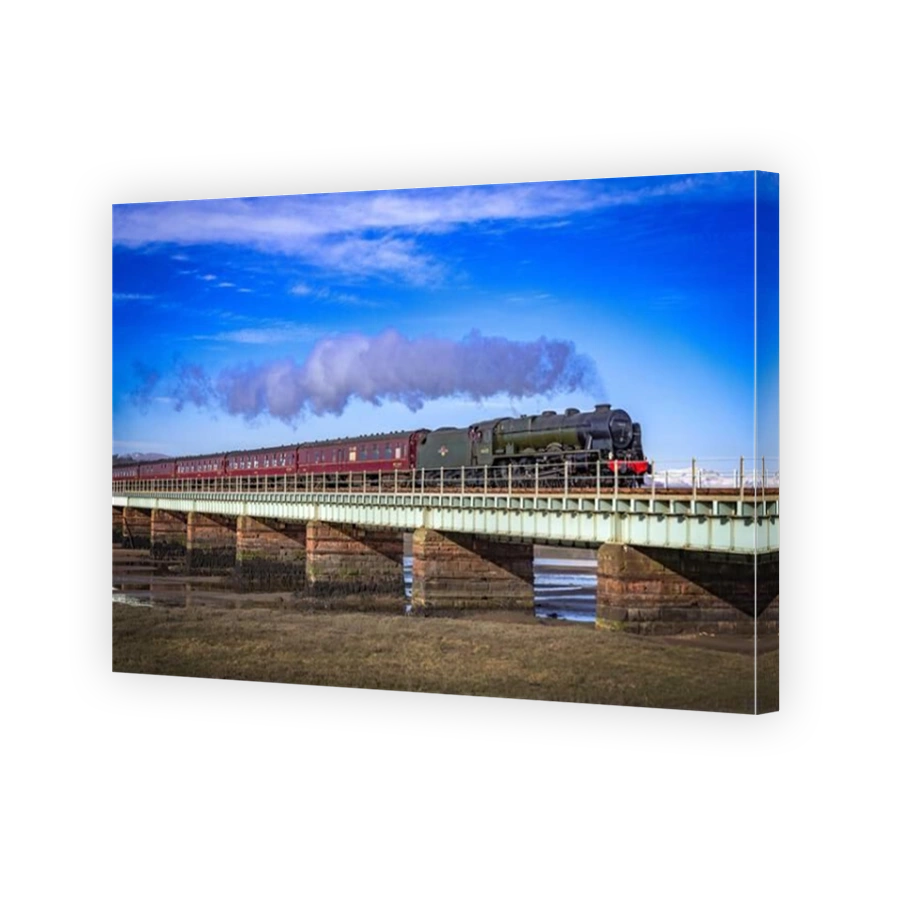 The Scots Guardsman steam train on the Eskmeals viaduct over the river Esk in Cumbria. steam train