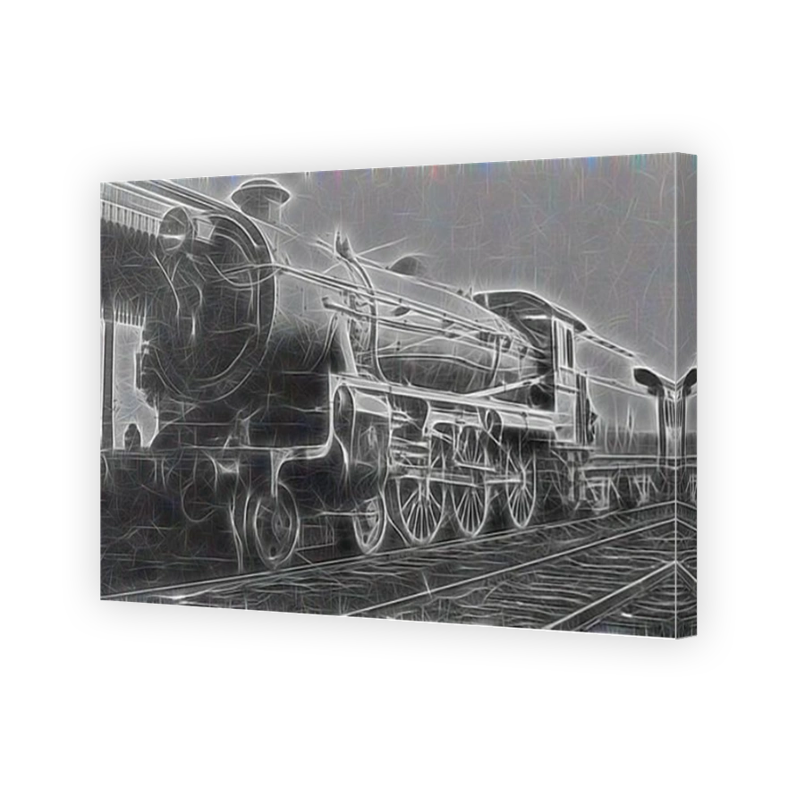 Steam locomotive sits on the tracks